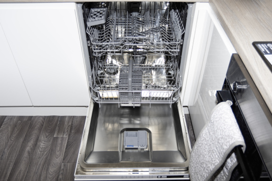 Fully integrated dishwasher for easy, hassle-free clean-up — added convenience for longer stays and self-catering guests.