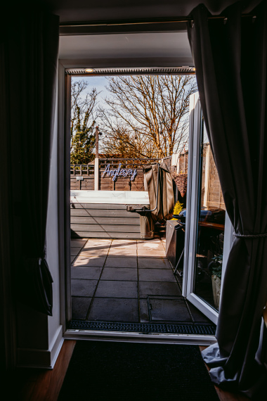 view of hot tub front back door 