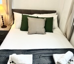 In each room: Microwave, plates, bowls, cutlery, tea, coffee, sugar, biscuits, kettle, mugs, drinking glasses