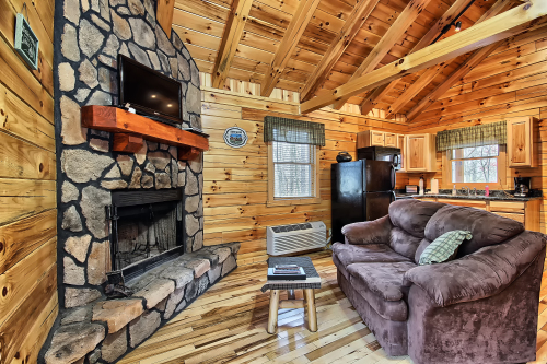 Sitting Area, with Wood-Burning Fireplace and Kitchen beyond