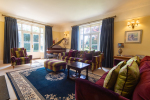 Drawing room with sofas and piano