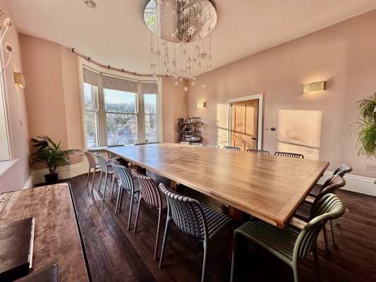 Dining table comfortably sits 18