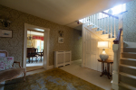 Hallway with view to dining room and stairs