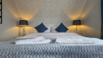 Sink into queen-size comfort. The third bedroom features a spacious bed that's perfect for a great night's sleep.