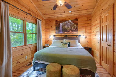 Spacious primary bedroom with king bed