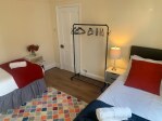 Spacious west facing bedroom with two singles on the ground floor (subject to request)