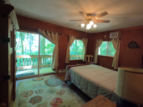 Main Bedroom with Access to Porch and Hot Tub