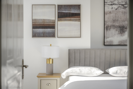 Warm and welcoming, this bedroom features a sumptuous double bed and a contemporary finish that creates an instant sense of relaxation. Ideal for guests looking for a quiet, restful space.