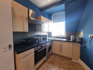 This photo represents kitchen  inside the property