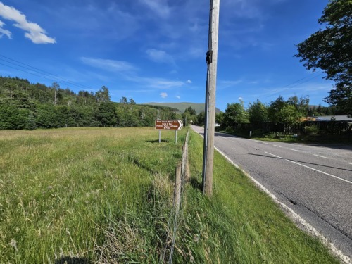 Road sign on A835 travelling from Ullapool