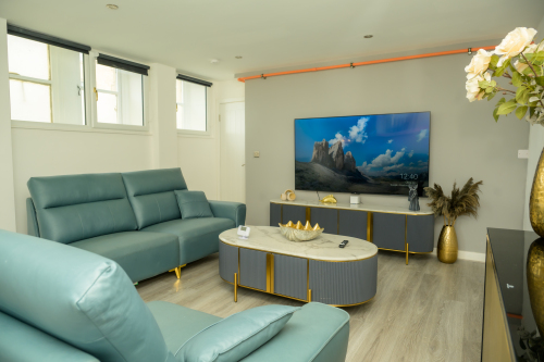 Spacious living room ideal for lounging, socialising, or enjoying a quiet evening.