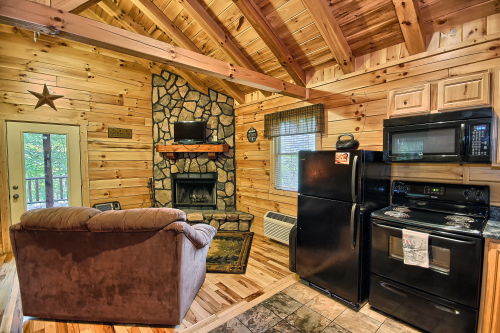 Sitting area, Wood-Burning Fireplace and part of Kitchen, Destiny's Daydream