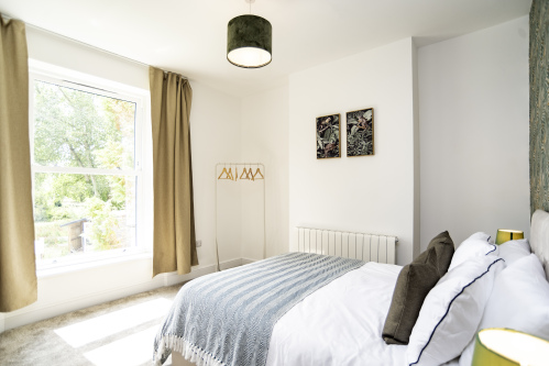 Bright & Beautiful Bedroom - Double bed with hotel-quality crisp linens refreshed after every stay, plus bedside tables, mirrors and tasteful décor