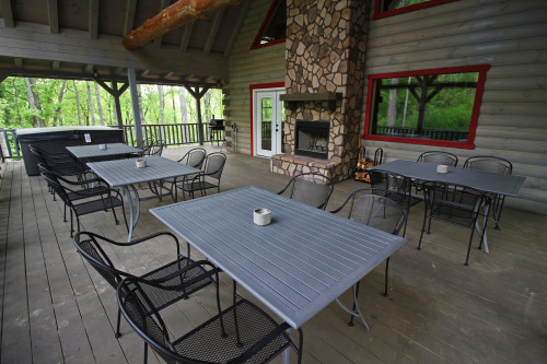 Outdoor Dining Tables, Hot Tub and Outdoor Fireplace, left side Deck, looking toward back, Rustic Cedar Inn 