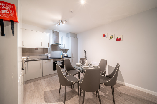 kitchen shared between 3 rooms