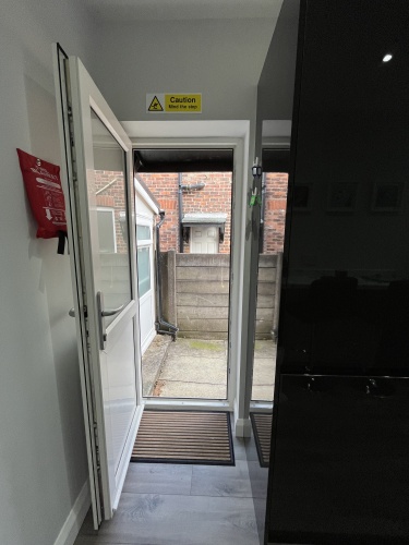 Kitchen - Access to the Laundry room, Patio and Back Garden
