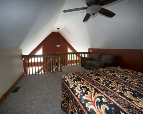 Loft bedroom with a queen size bed