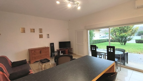 pièce à vivre ouvrant sur jardin privatif 100 m²