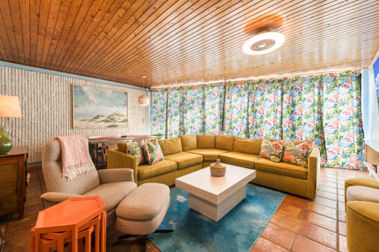 Wall to wall curtains can be closed for the morning sun. 