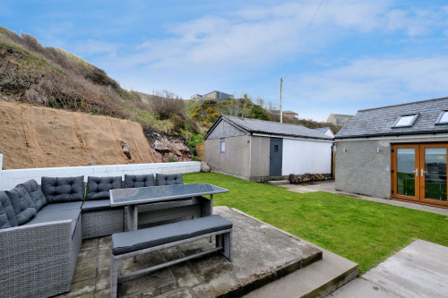 Double doors from Kitchen lead into a large fully enclosed garden