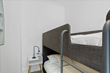 Second bedroom with full size single bunk beds