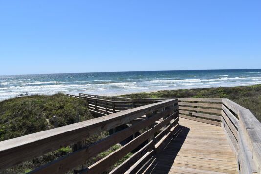 Beachwalk (stairs at the end) those with disabilities can drive onto the beach. Ask me about this! 