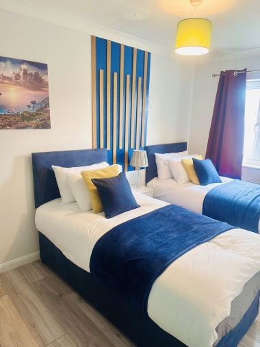 SECOND BEDROOM with two single beds which can be zip linked to make king size bed