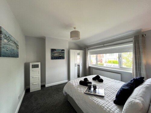 Bedroom two - light and spacious with king size bed and wardrobe