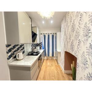 This photo represents the kitchen of the flat. 