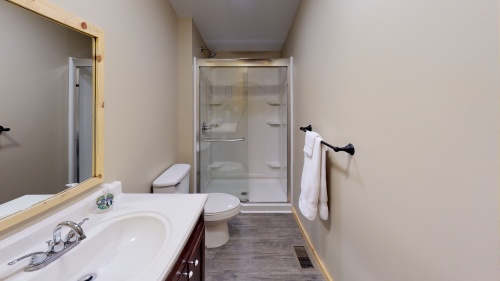Full Bathroom comes equipped with stand up shower. 