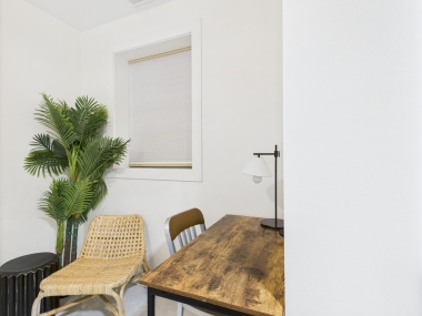 Desk area in the primary bedroom, perfect for work or relaxation.