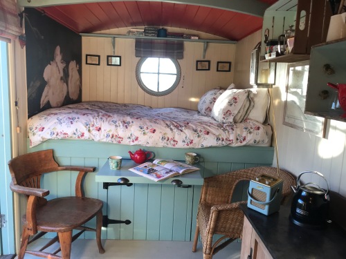 Inside the Artisan shepherd's hut with kingsized bed