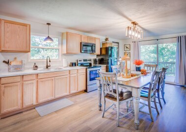 Enjoy family meals in this spacious kitchen fully stocked. 
