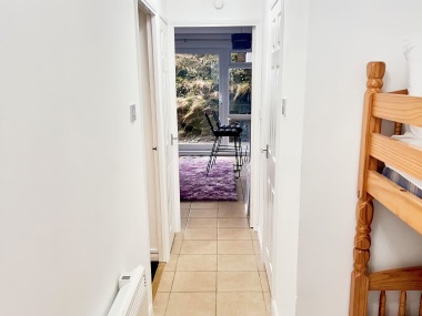 hall area and bunk beds 