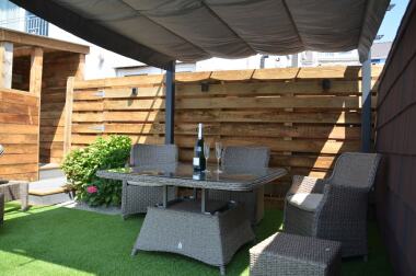 Outside the glamping pod seating area 