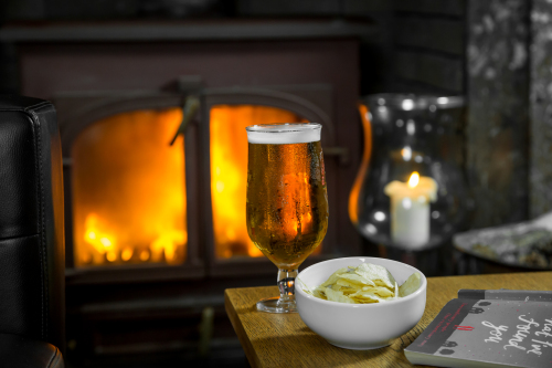 Relax by the fire with a drink