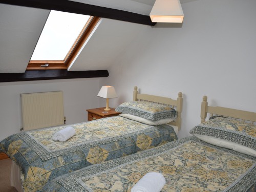 Twin Beds in the Wistaria Cottage