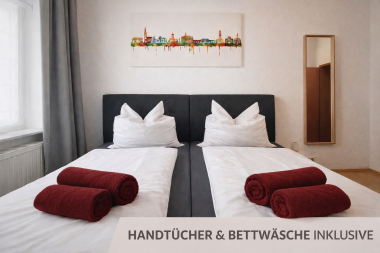  Bedroom with king-size bed and large wardrobe