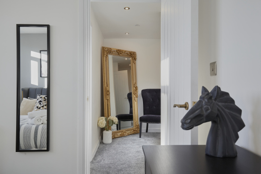 Relax and unwind in this cosy double bedroom, designed for a peaceful night’s sleep.