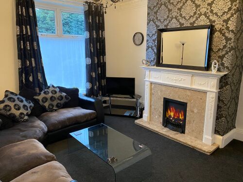 Sizeable lounge with Smart TV and comfortable sofa