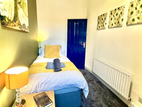 Bedroom 4 - A relaxing space to unwind and recharge nightly.