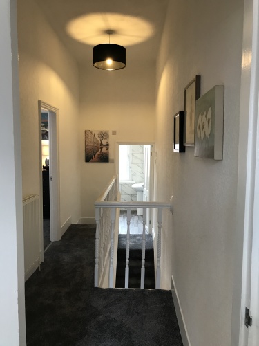 Upstairs landing leading to two bedrooms, bathroom and office