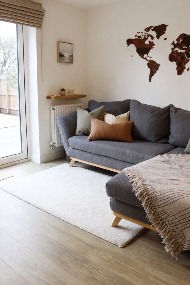 Relax on the sofa and enjoy peaceful views of the private patio garden through elegant French doors. Framed by beautiful mature trees, this bright and tranquil space is perfect for morning coffee, reading or unwinding after a day of exploring.