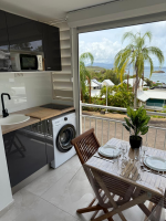 Véranda et cuisine aménager et lave linge disponible pour des séjours long. studio mya evasion 119  tartane