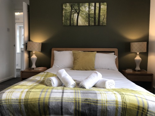 Comfy double bed with fresh linen a selection of medium and soft pillows and towels - Bamber Bridge Preston