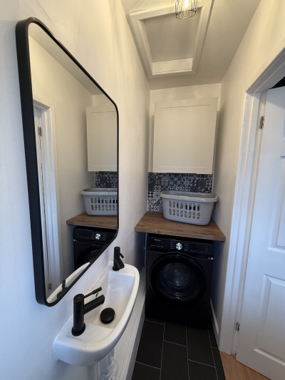 Separate downstairs cloakroom with washer dryer