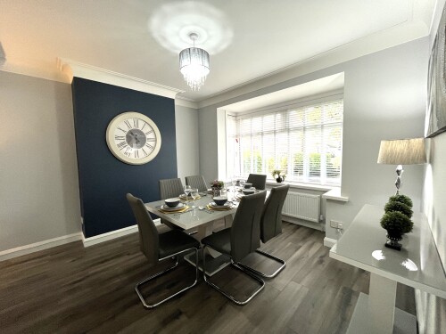 Dining area - Full dinnerware, silverware and selection of glasses