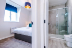 A cosy bedroom featuring a comfortable double bed, perfect for restful nights and relaxing stays.