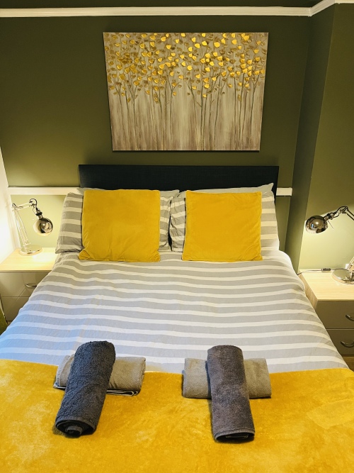 Modern yellow bedroom with daybed