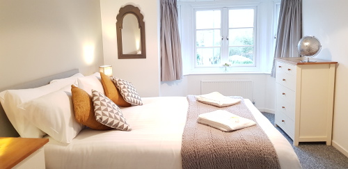 Main Bedroom with views towards the meadows
